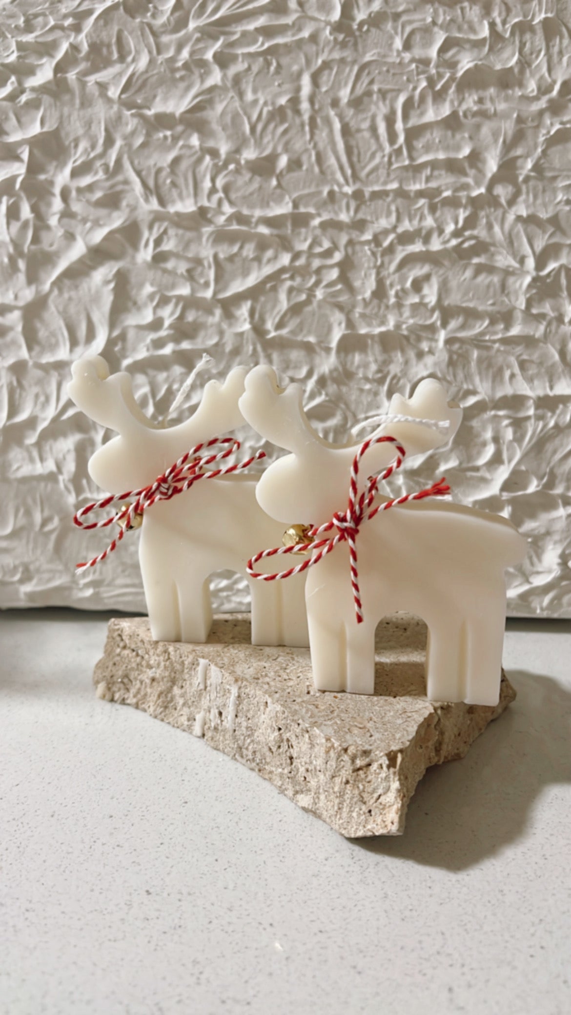 Classiicollection's handcrafted scented rainbow reindeer candles, front picture